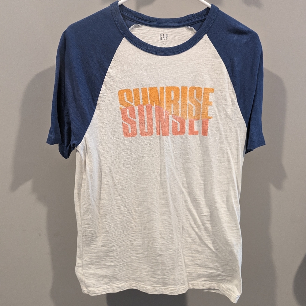 Sunrise/sunset baseball style shirt.